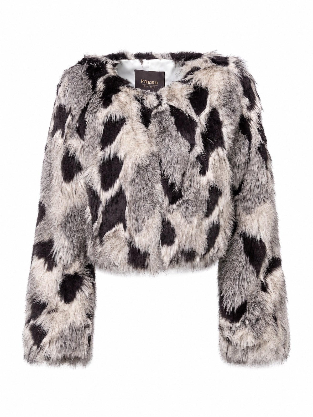 Premium cruelty-free faux fur cropped jacket in a silver fox pattern with a collarless silhouette, plush texture, and multi-tonal black, ivory, and gray finish.