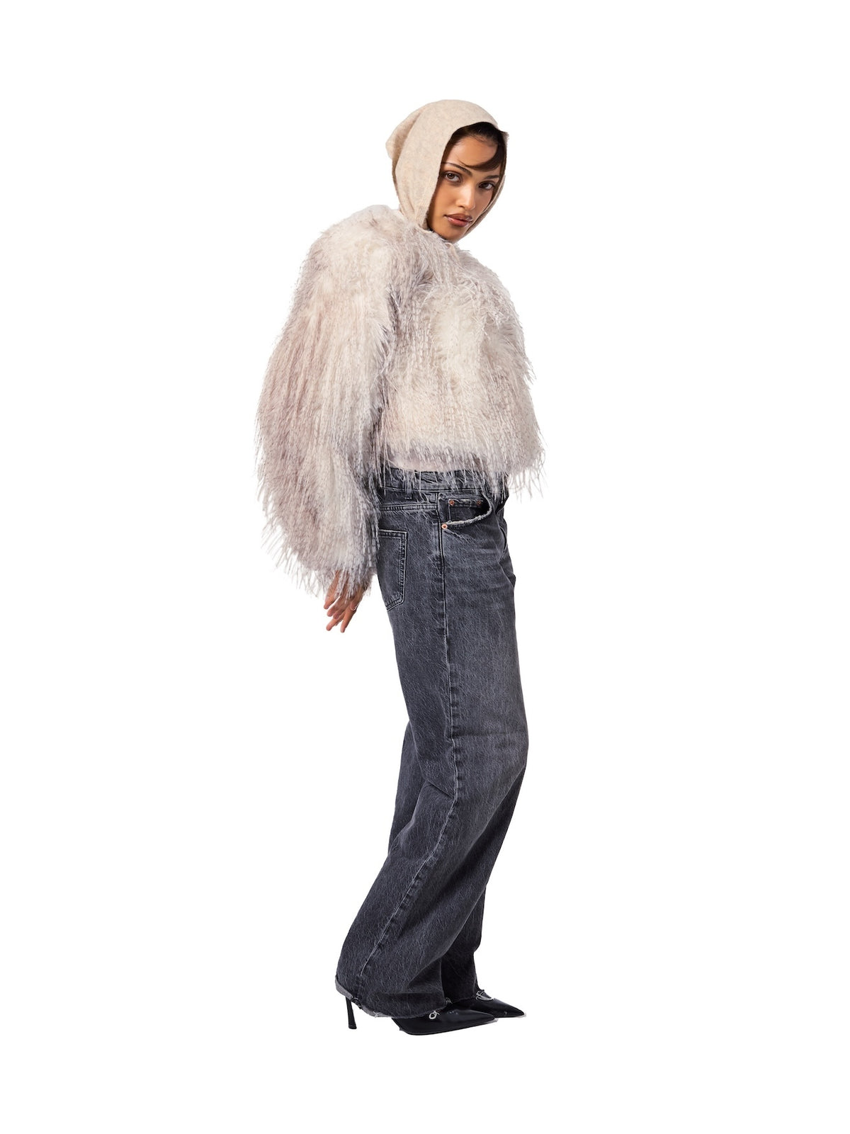 Model wearing the FREED Anna Feather faux fur jacket in a bold Fall 2026 fashion editorial.