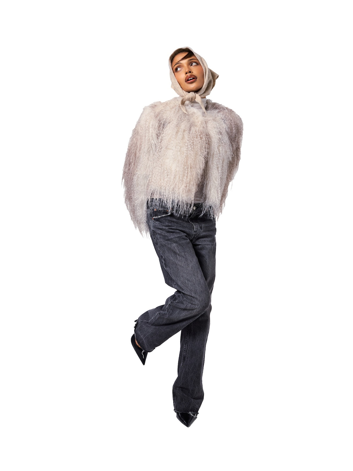 Model in the FREED Anna Feather faux fur jacket, captured in a striking editorial portrait with soft neutral tones.