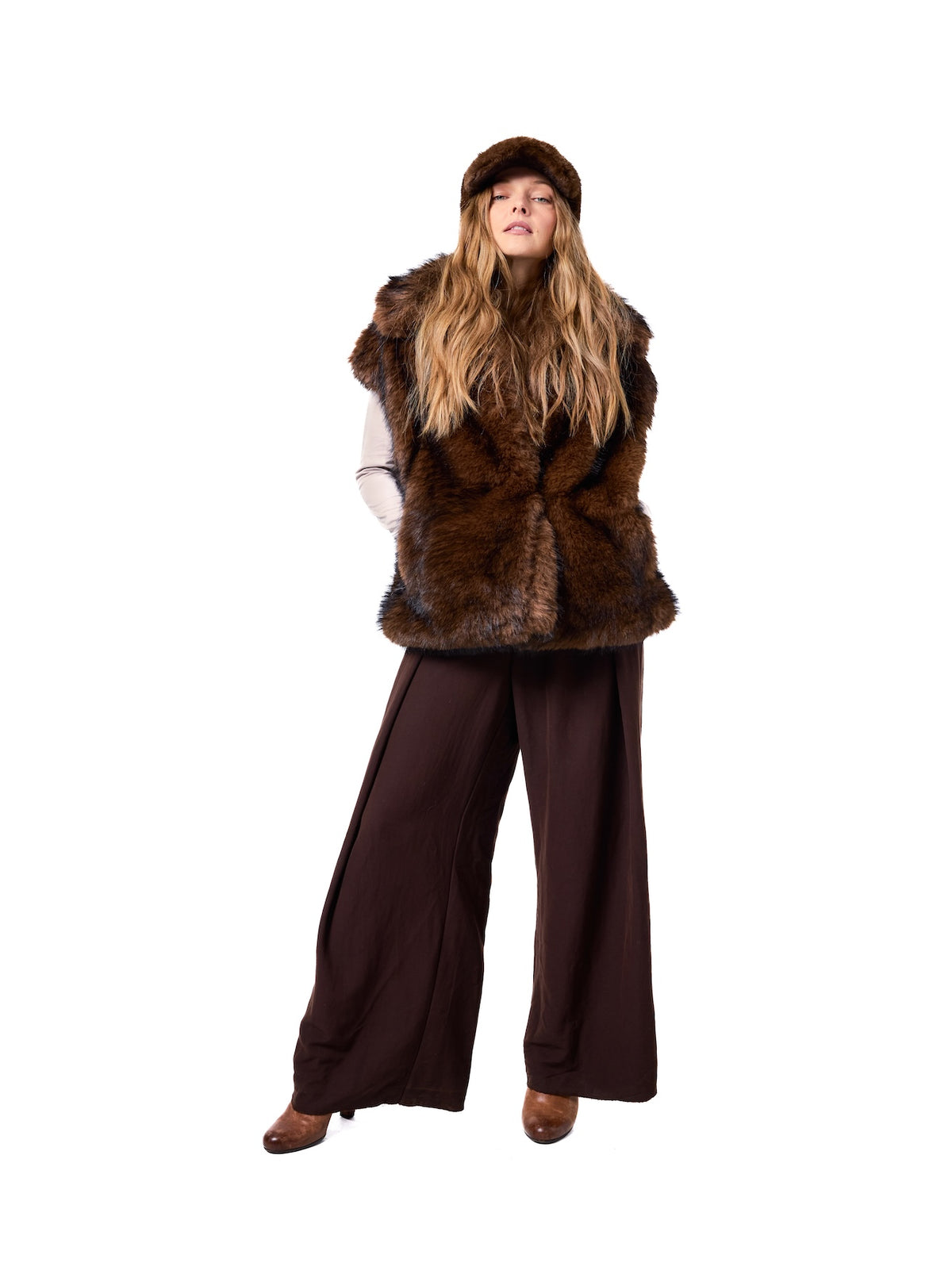 MIA vest in Grizzly — front view of a luxurious dark brown faux fur vest featuring a plush oversized collar, sleeveless silhouette, rich grizzly-inspired coloring, and sophisticated layered styling.