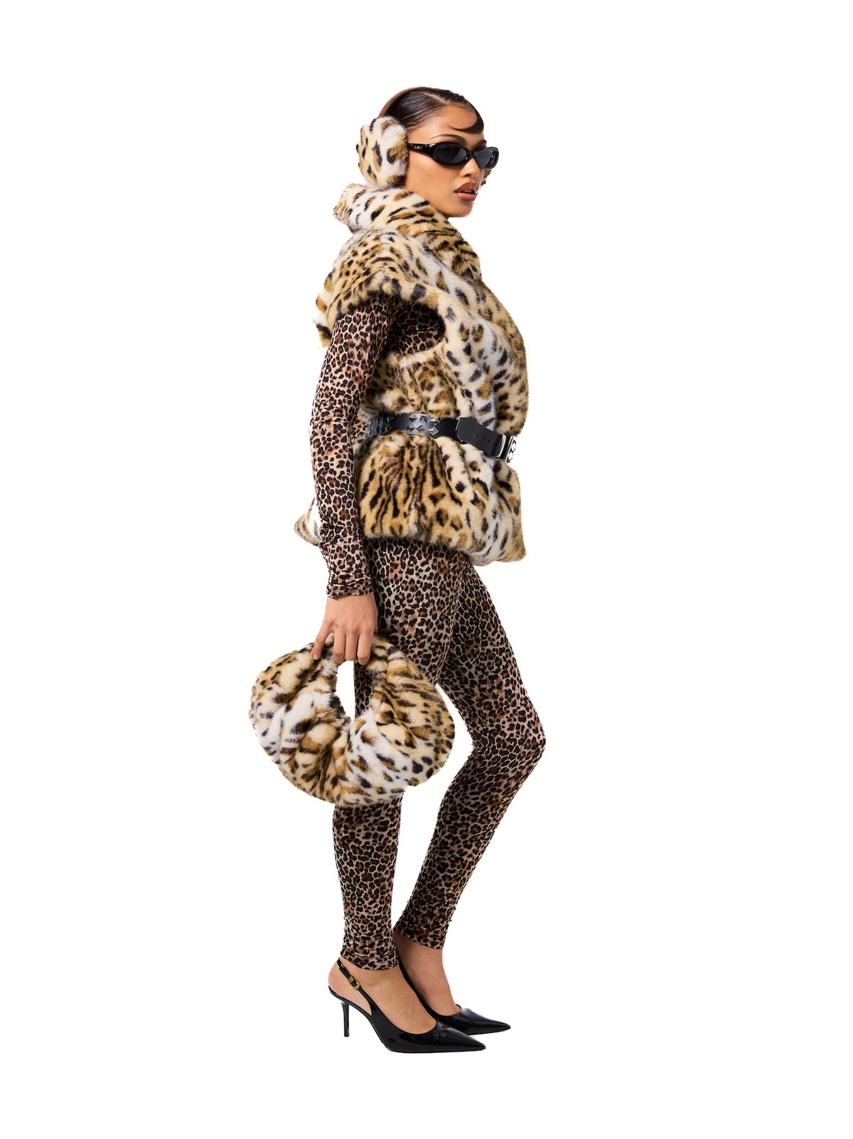 MIA vest in Leopard — side profile highlighting the soft faux fur texture, bold leopard pattern, oversized collar detail, and relaxed sleeveless fit.