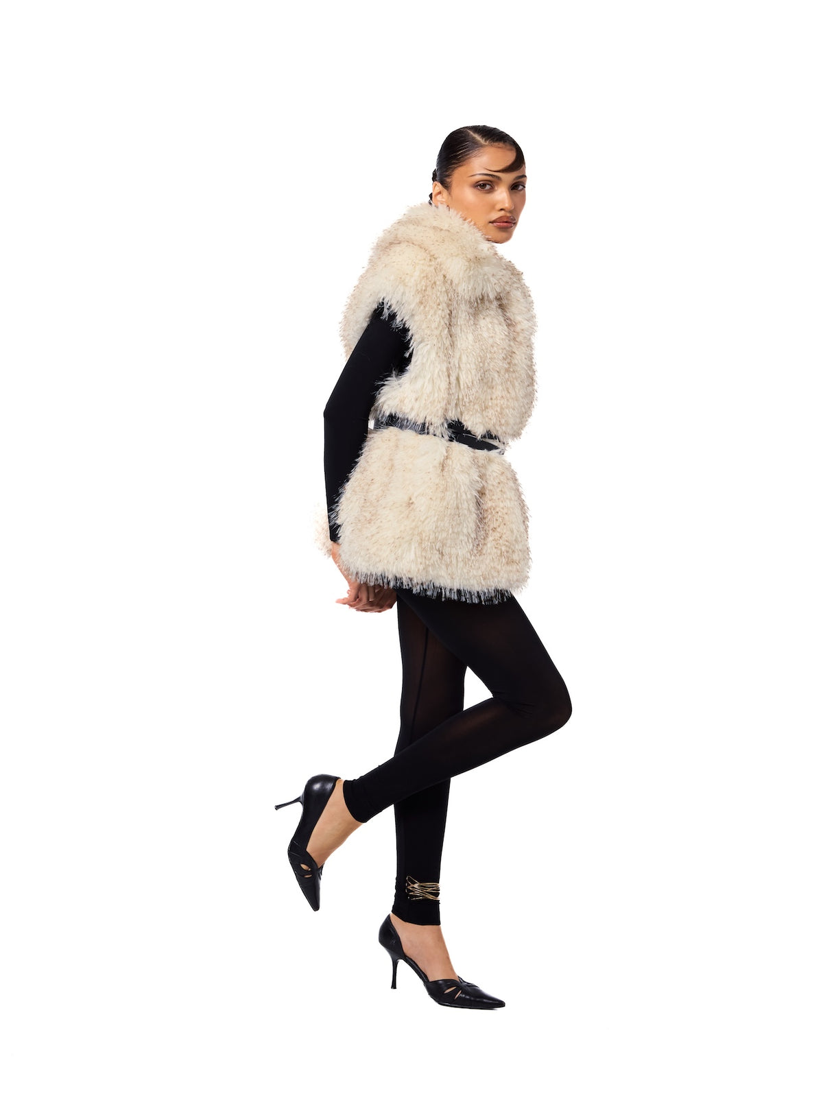 MIA vest in Pebble — side profile highlighting the plush faux fur texture, oversized shawl collar, elegant neutral color, and relaxed sleeveless fit.