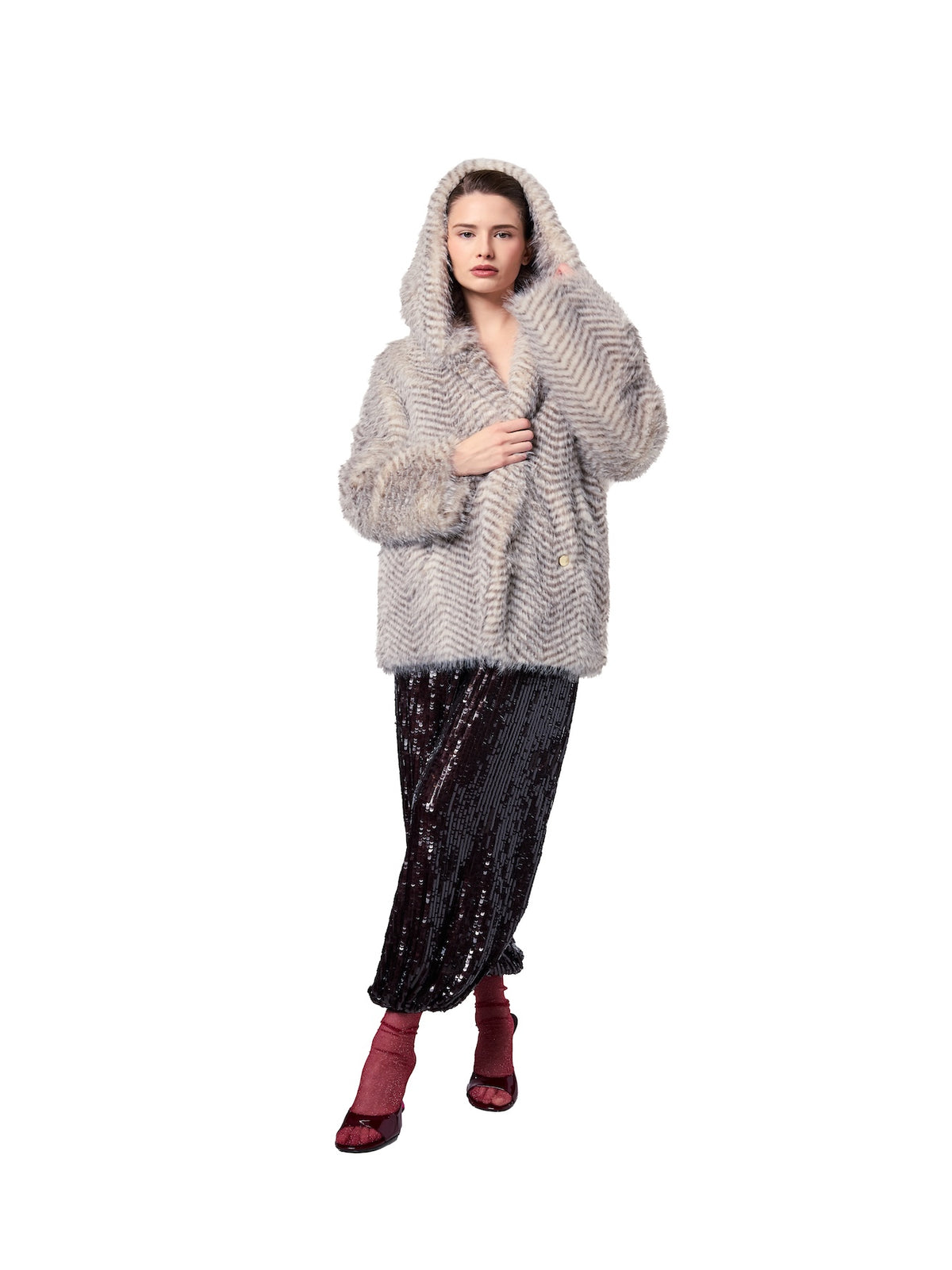 NIKI jacket in Snow Lynx featuring a plush cruelty-free faux fur finish, oversized hood, relaxed silhouette, and luxurious winter styling.