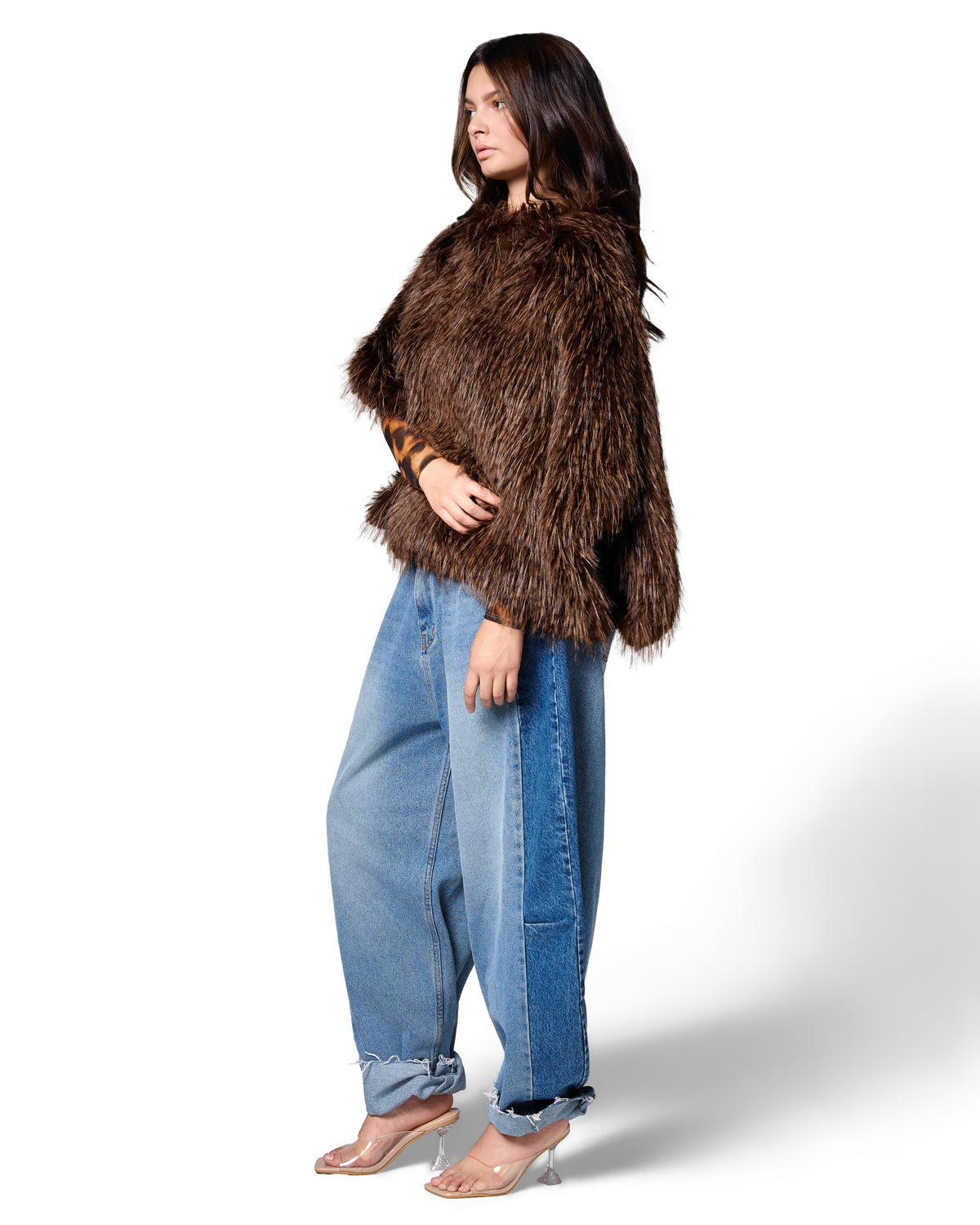 FREED Collette Sable cape in deep chocolate faux fur, creating a bold layered fall look.