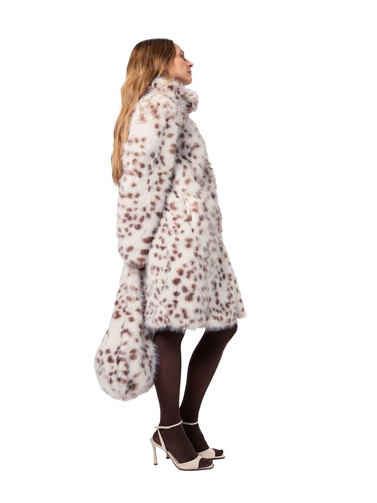 AUDREY coat in Java Bean — side profile highlighting the luxurious faux fur texture, elegant stand collar, relaxed silhouette, and coordinating shopper tote.