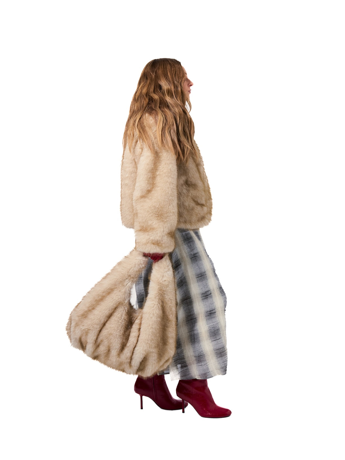 CORI jacket in Fox — side profile highlighting the plush faux fur construction, cropped fit, oversized collar detail, and rich fox-inspired neutral tones.