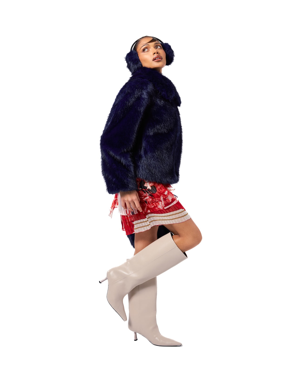 CORI jacket in Sapphire — side profile highlighting the rich sapphire blue faux fur, cropped fit, plush texture, oversized collar, and elegant statement styling.