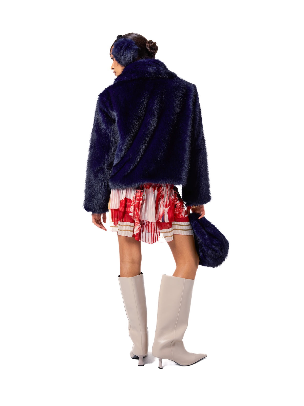 CORI jacket in Sapphire — back view showcasing the vibrant sapphire blue faux fur, soft luxurious texture, clean cropped silhouette, and premium craftsmanship.