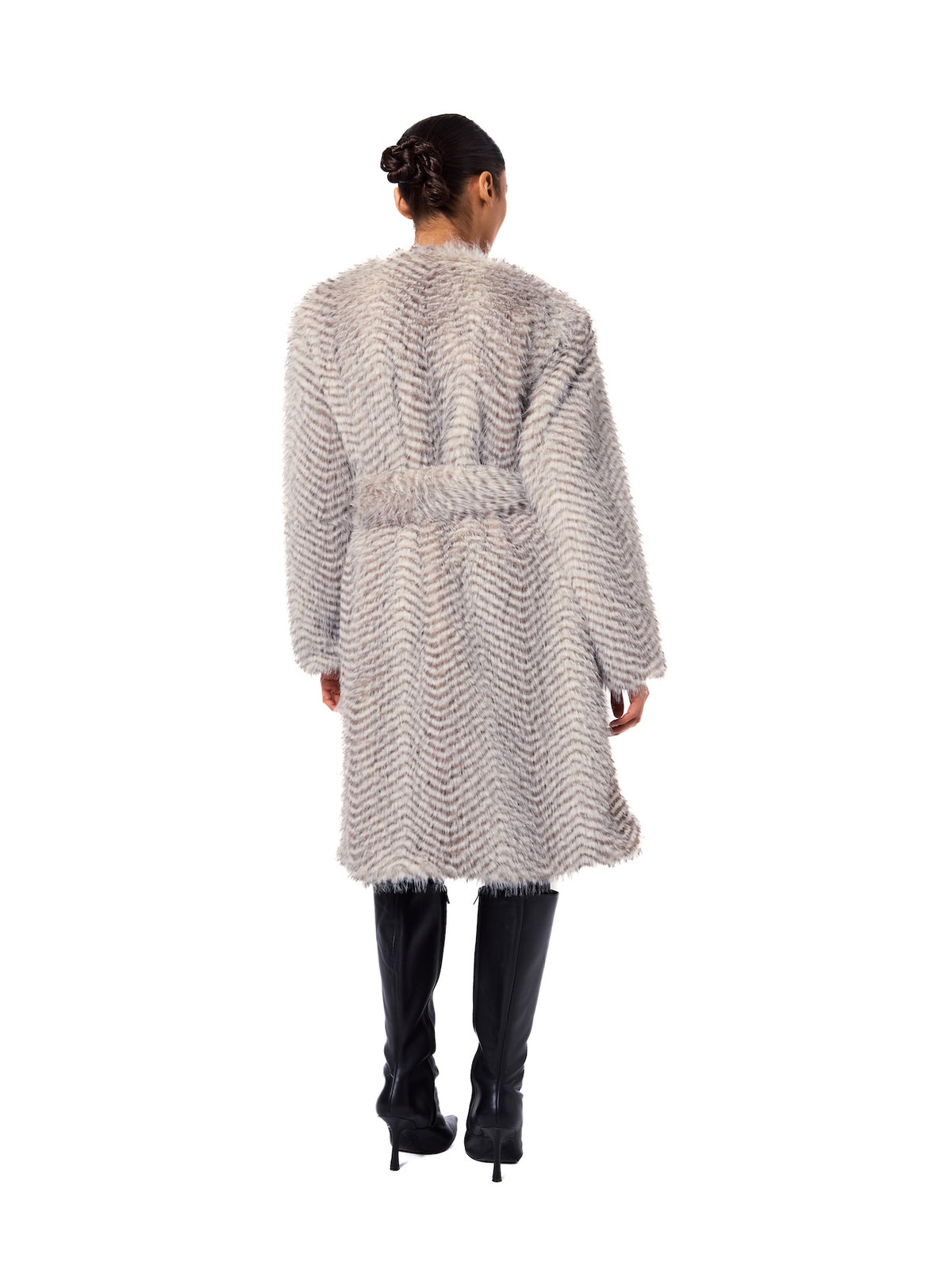 Back view of the STELLA Snow Lynx coat highlighting the elegant drape, removable belt, premium faux fur texture, and flattering silhouette.